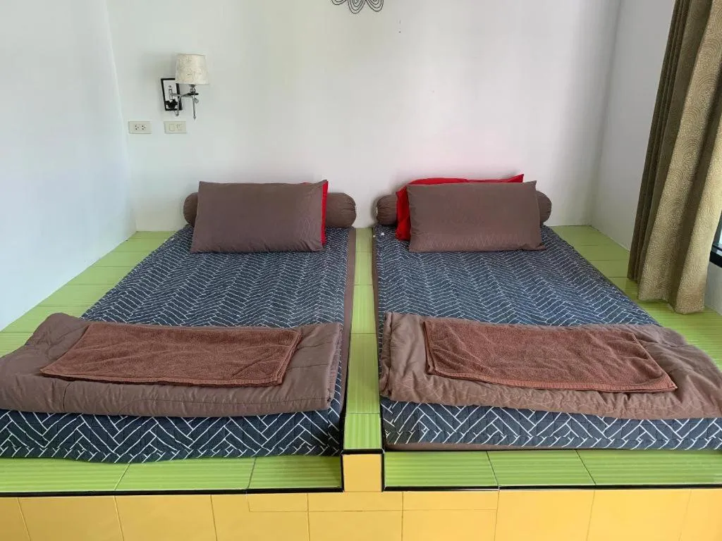 Bed in Sweet Garden Home Resort
