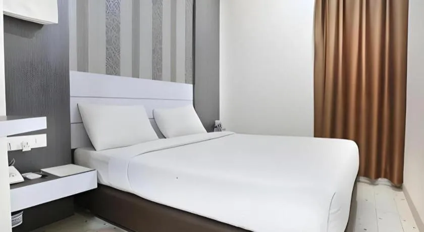 Bed in Redlink Hotel