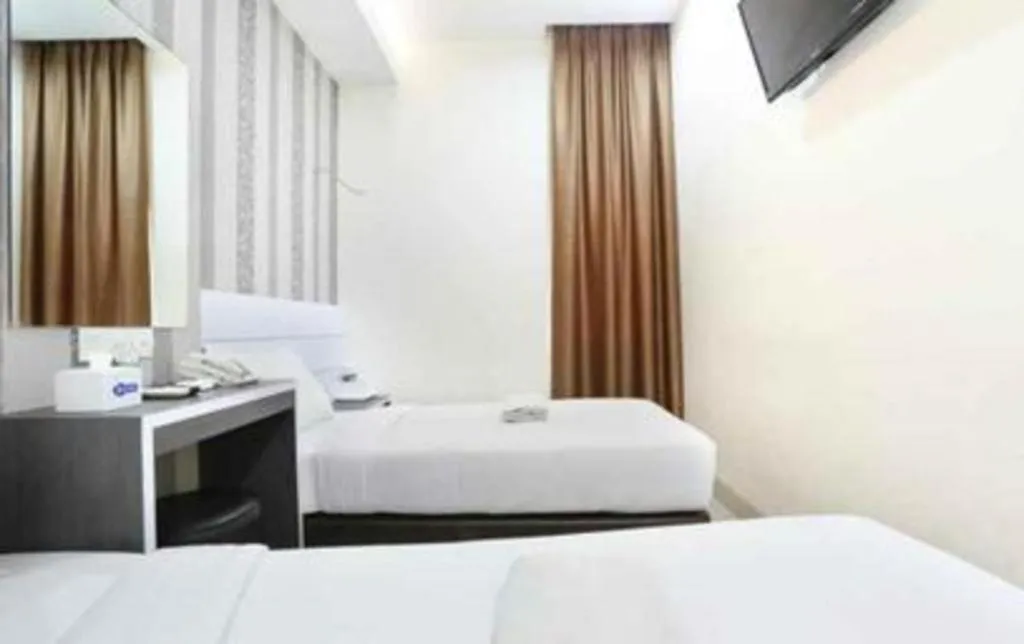 Bed in Redlink Hotel