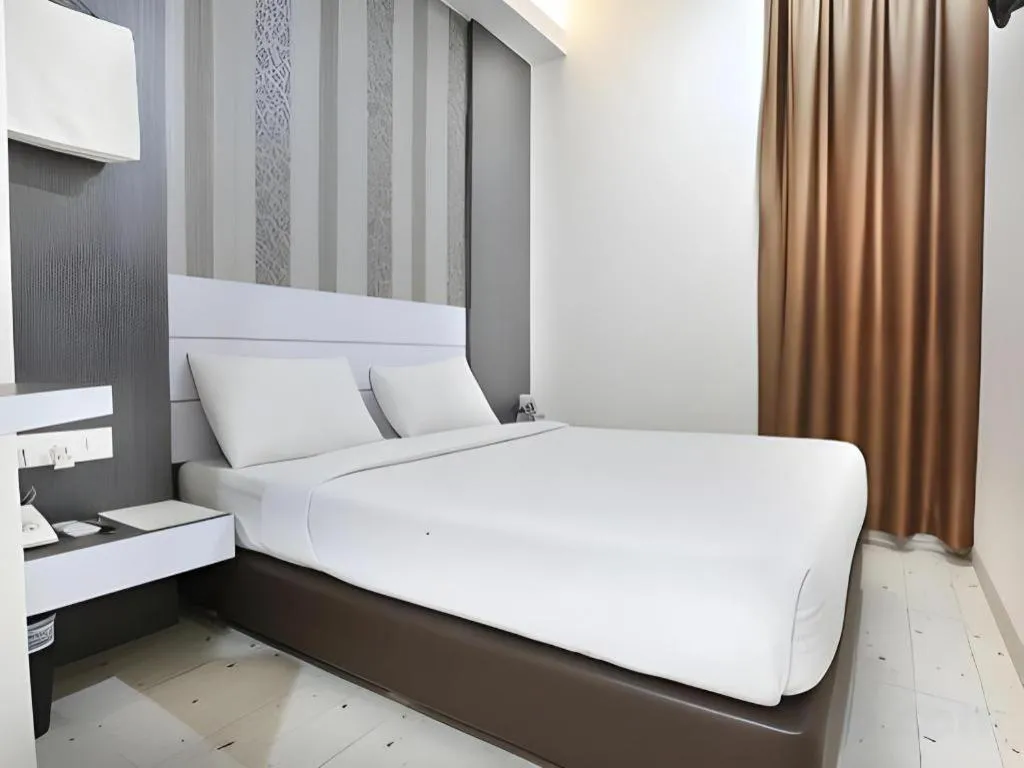 Bed in Redlink Hotel
