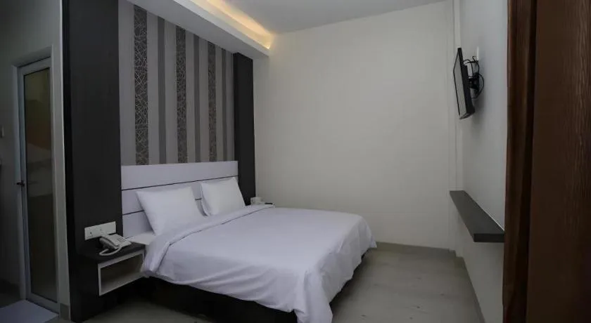 Bed in Redlink Hotel