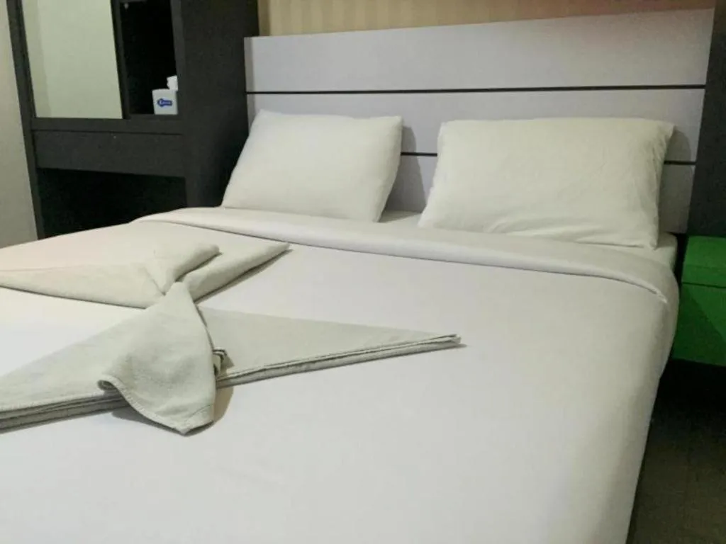 Bed in Redlink Hotel