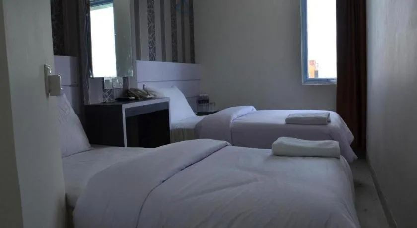 Bed in Redlink Hotel