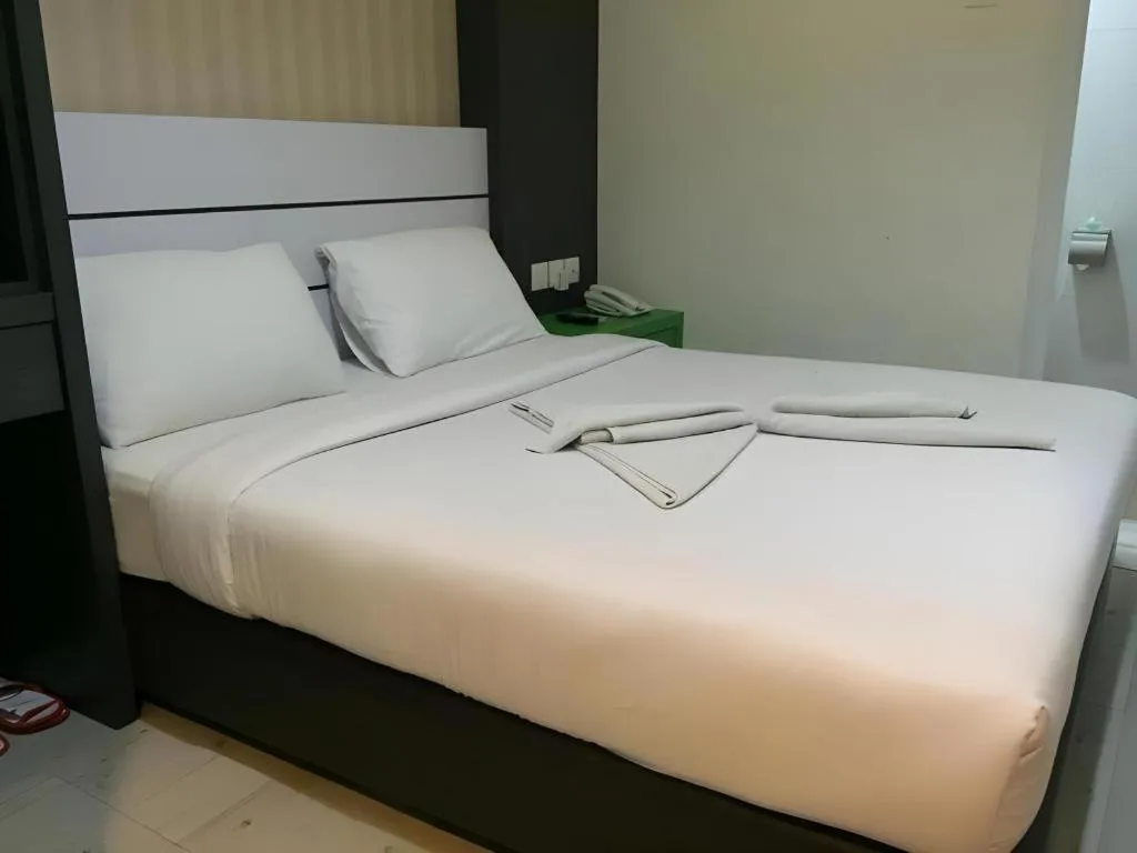 Bed in Redlink Hotel