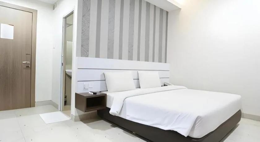 Bed in Redlink Hotel