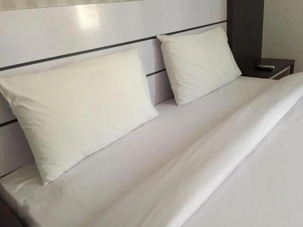 Bed in Redlink Hotel