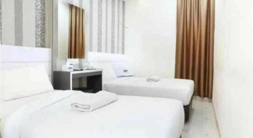 Bed in Redlink Hotel