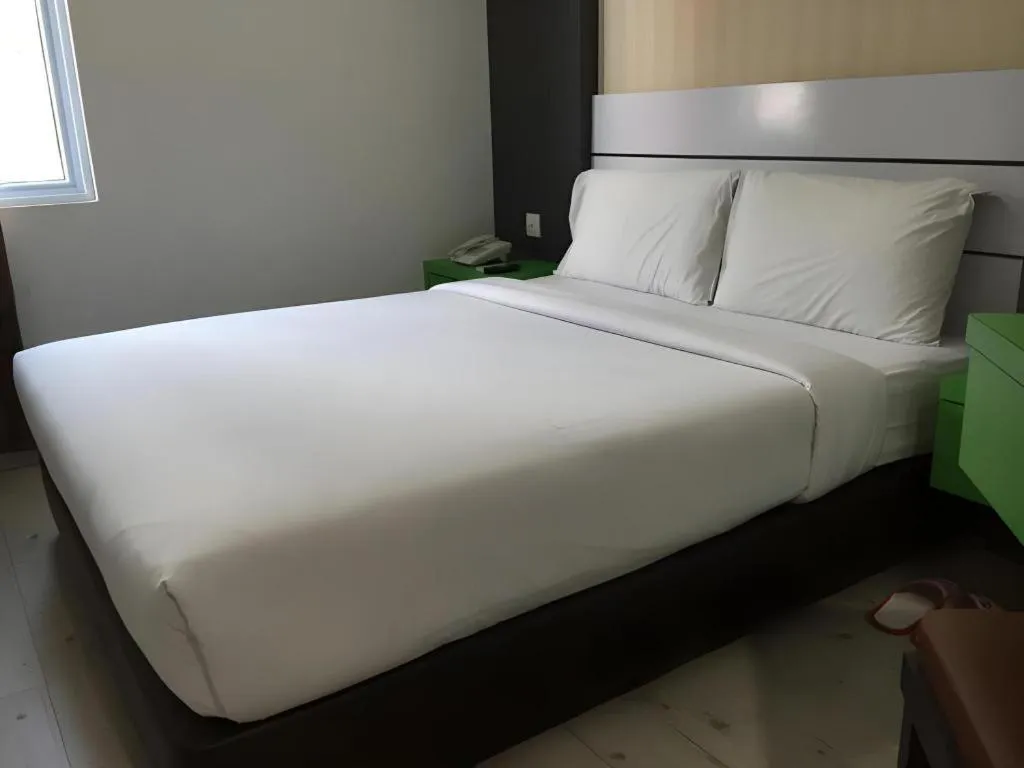 Bed in Redlink Hotel