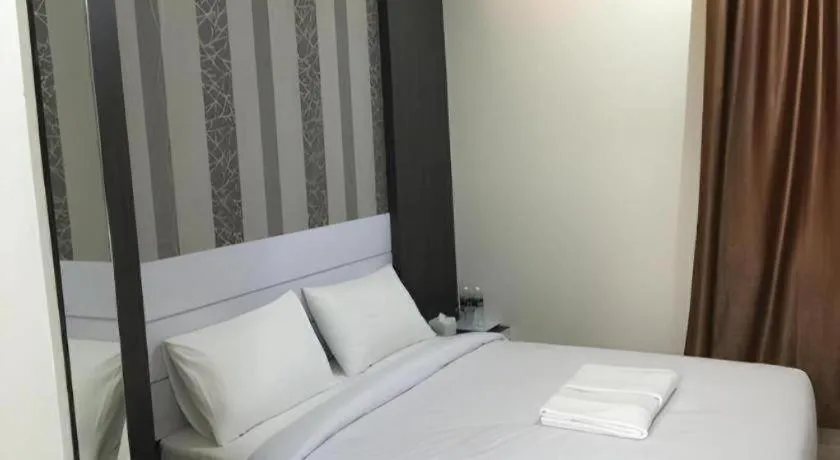 Bed in Redlink Hotel