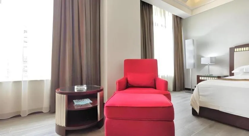 Bed in Hua Xia Pearl Hotel