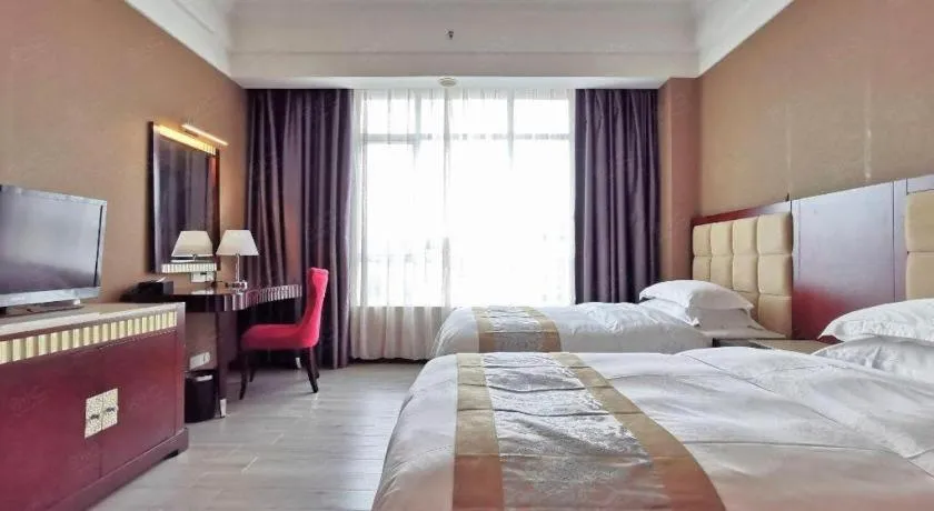 Bed in Hua Xia Pearl Hotel