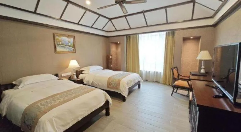 Bed in Hua Xia Pearl Hotel