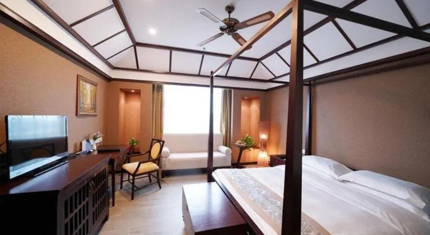 Bed in Hua Xia Pearl Hotel