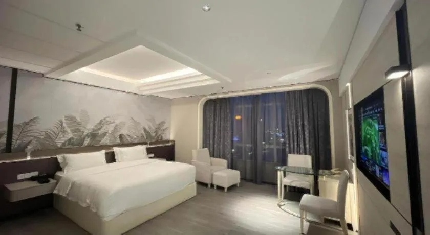 Bed in Hua Xia Pearl Hotel