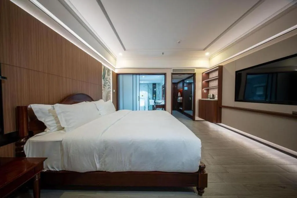 Bed in Hua Xia Pearl Hotel