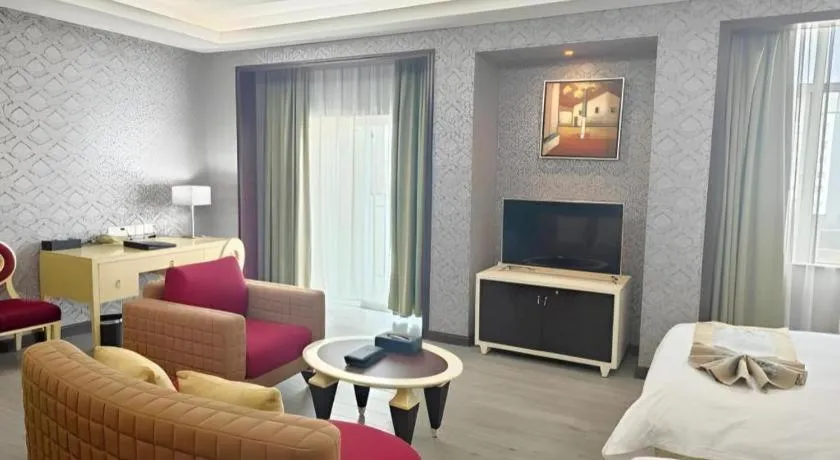 Bed in Hua Xia Pearl Hotel