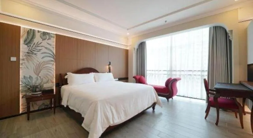 Bed in Hua Xia Pearl Hotel