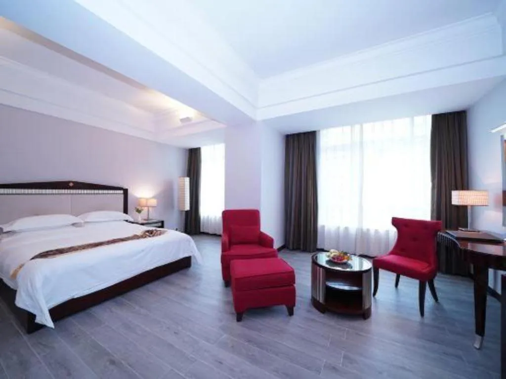 Bed in Hua Xia Pearl Hotel