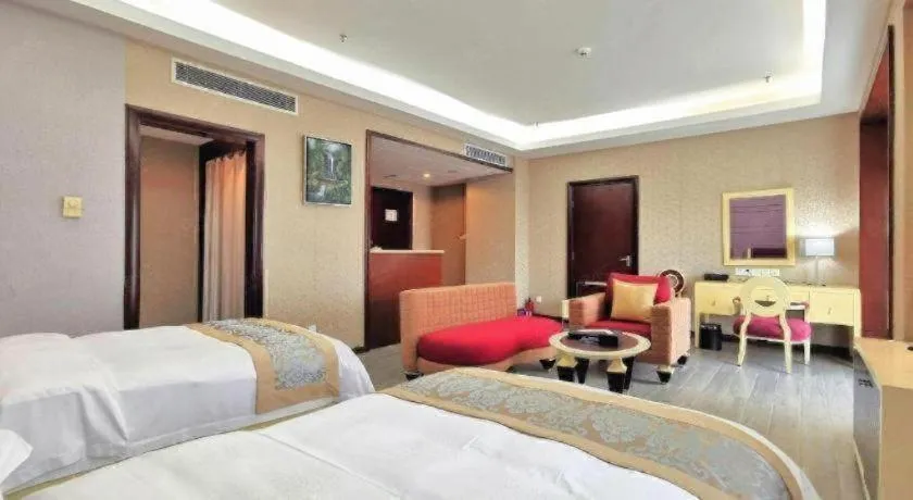 Bed in Hua Xia Pearl Hotel