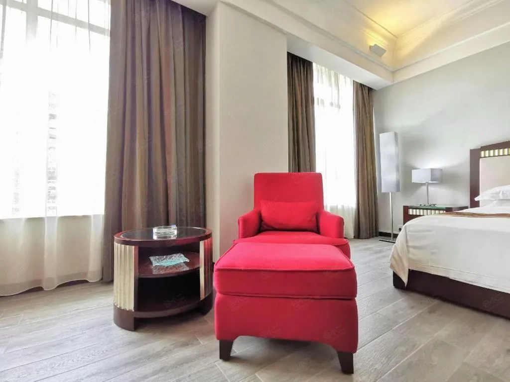 Bed in Hua Xia Pearl Hotel