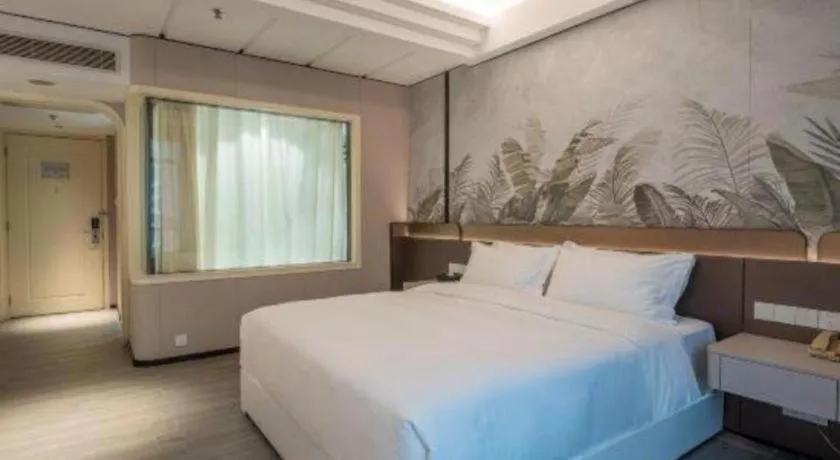 Bed in Hua Xia Pearl Hotel