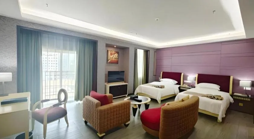 Bed in Hua Xia Pearl Hotel