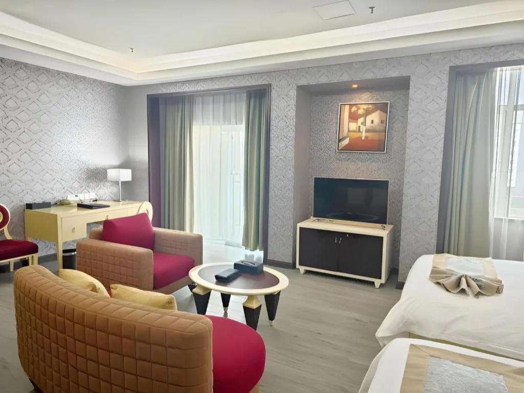 Bed in Hua Xia Pearl Hotel