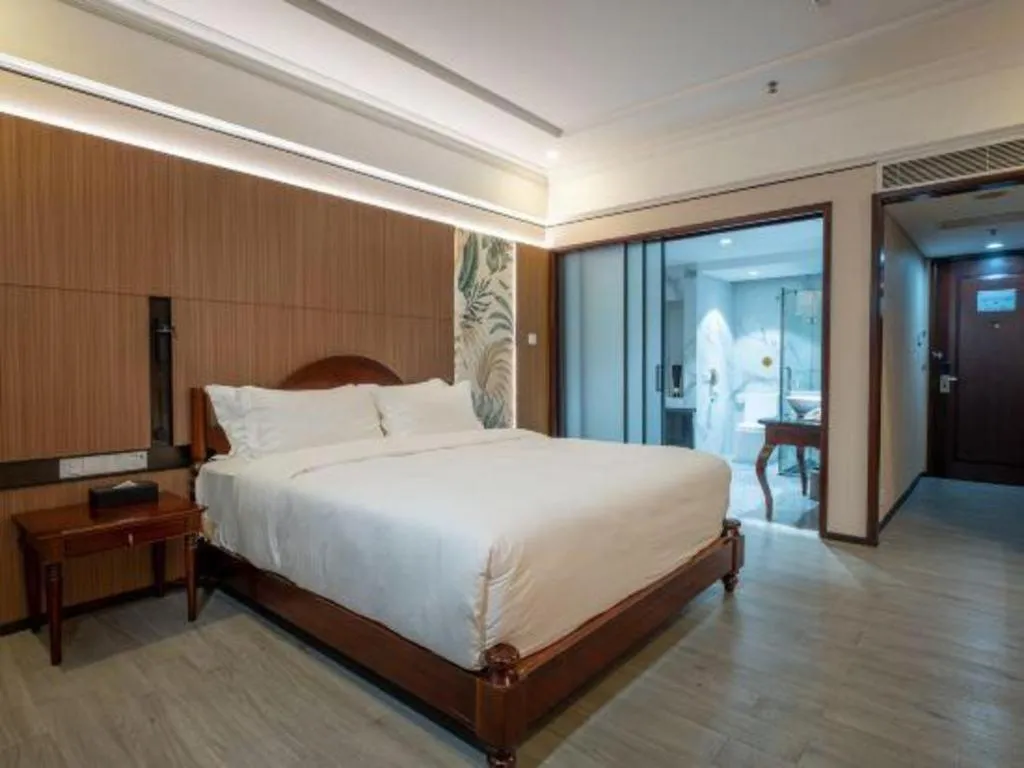 Bed in Hua Xia Pearl Hotel