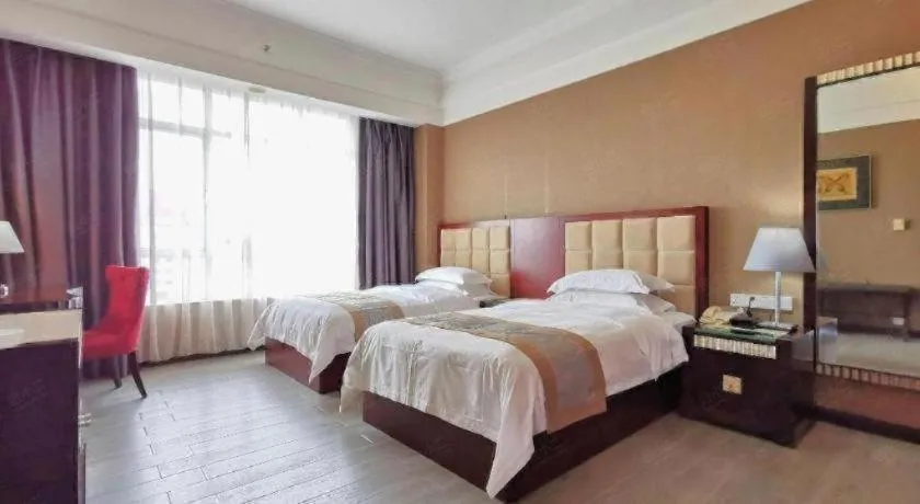 Bed in Hua Xia Pearl Hotel