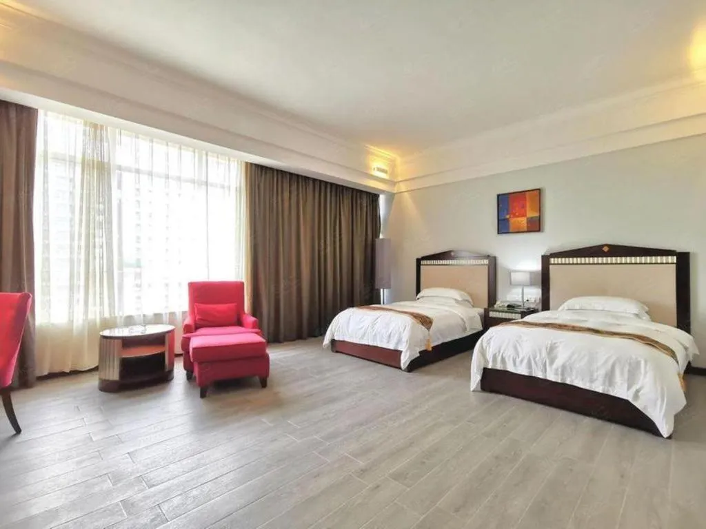 Bed in Hua Xia Pearl Hotel