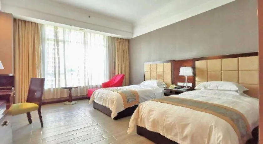 Bed in Hua Xia Pearl Hotel