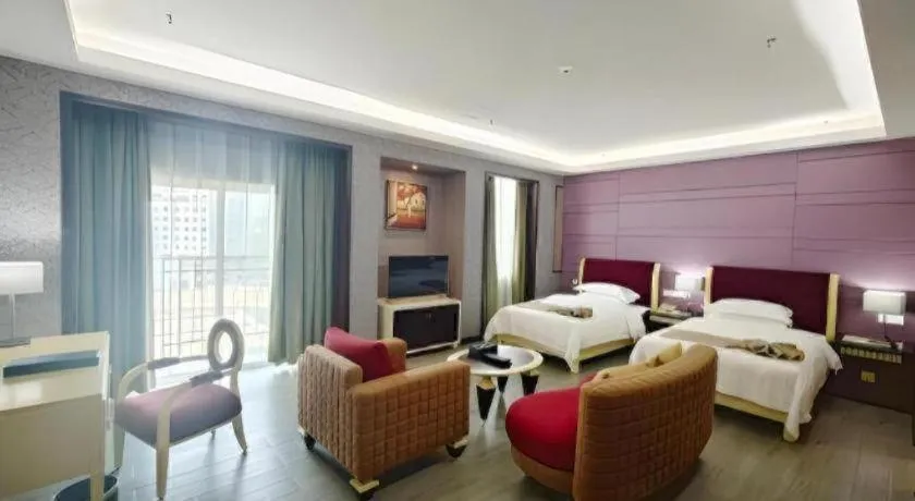 Bed in Hua Xia Pearl Hotel