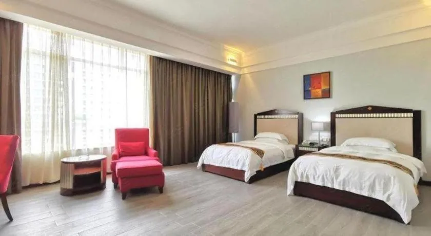 Bed in Hua Xia Pearl Hotel