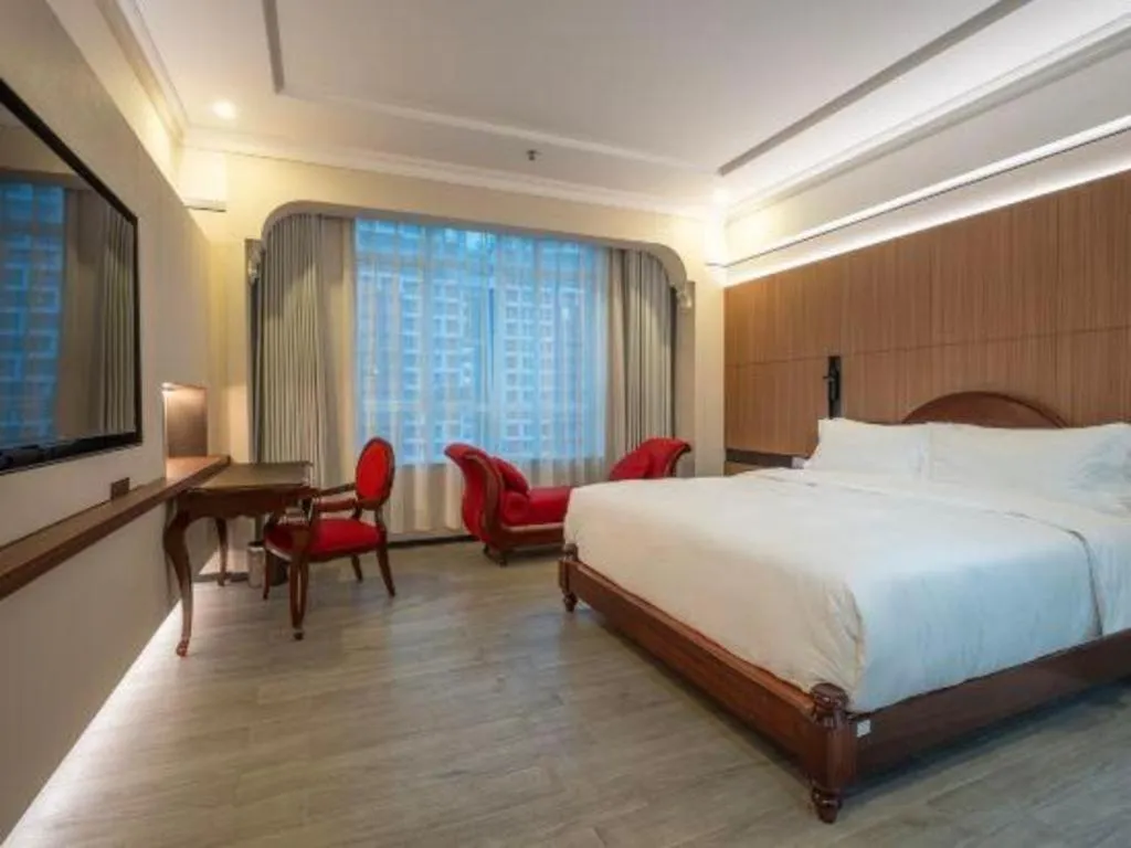 Bed in Hua Xia Pearl Hotel