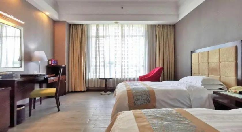 Bed in Hua Xia Pearl Hotel