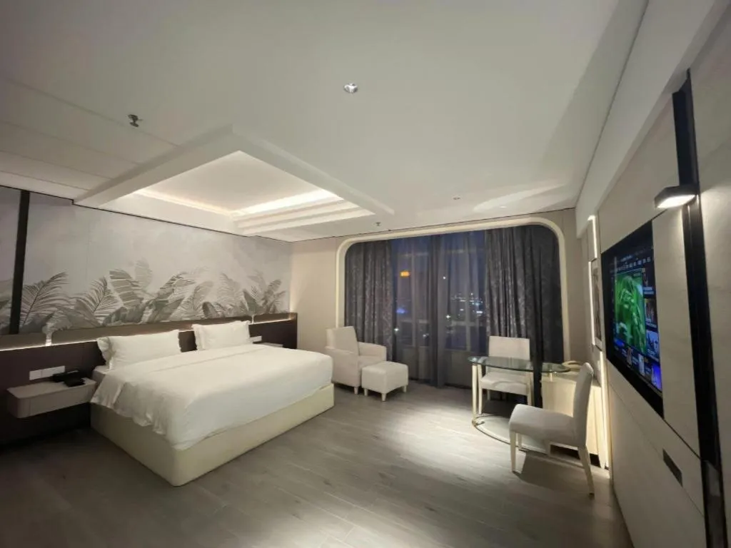 Bed in Hua Xia Pearl Hotel