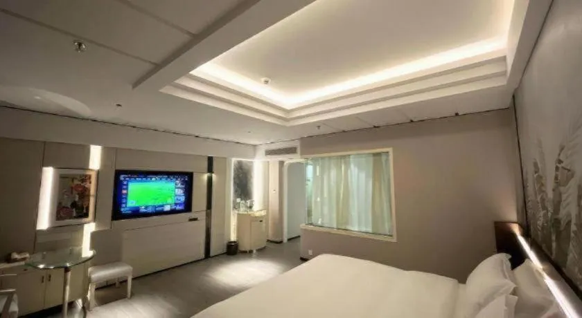 Bed in Hua Xia Pearl Hotel