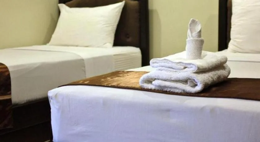 Bed in Peridot Suites