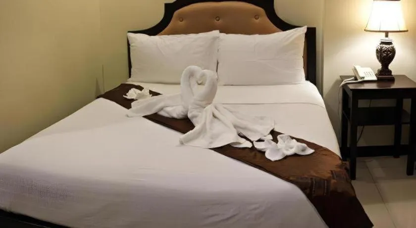 Bed in Peridot Suites