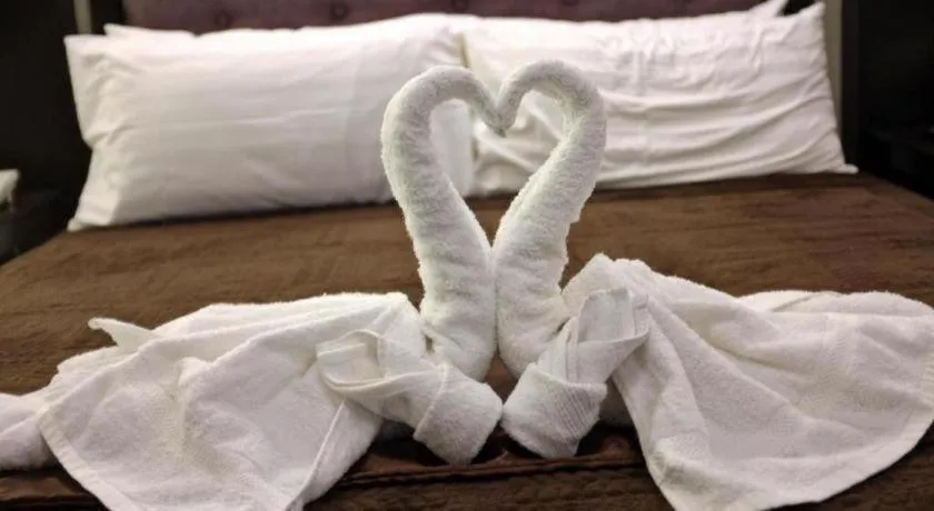 Bed in Peridot Suites