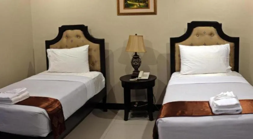 Bed in Peridot Suites