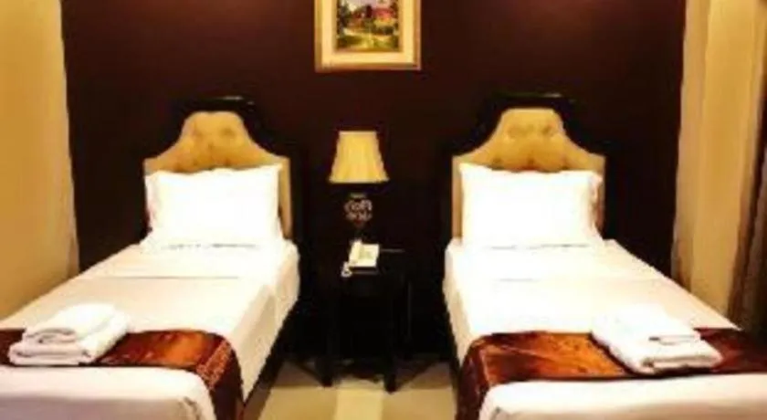 Bed in Peridot Suites