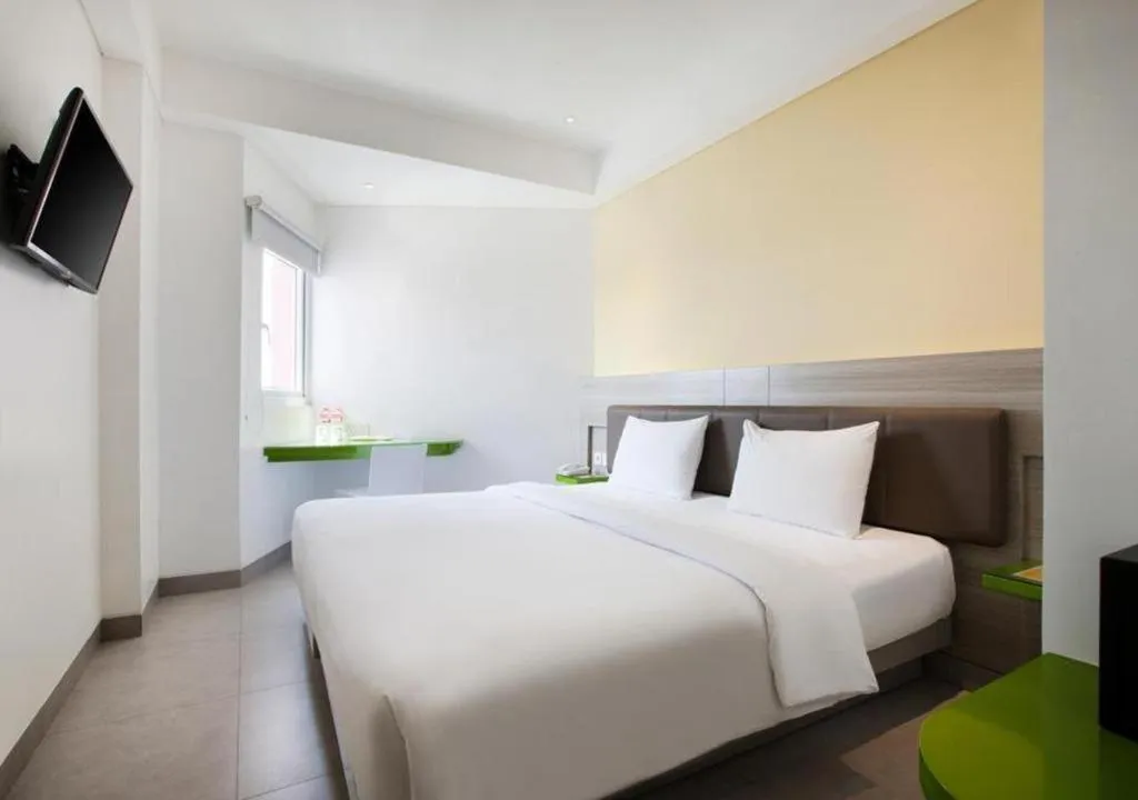 Bed in Amaris Hotel Kupang