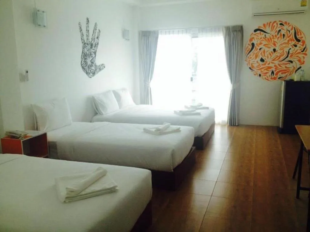 Bed in The Pride Hotel At Laemsing