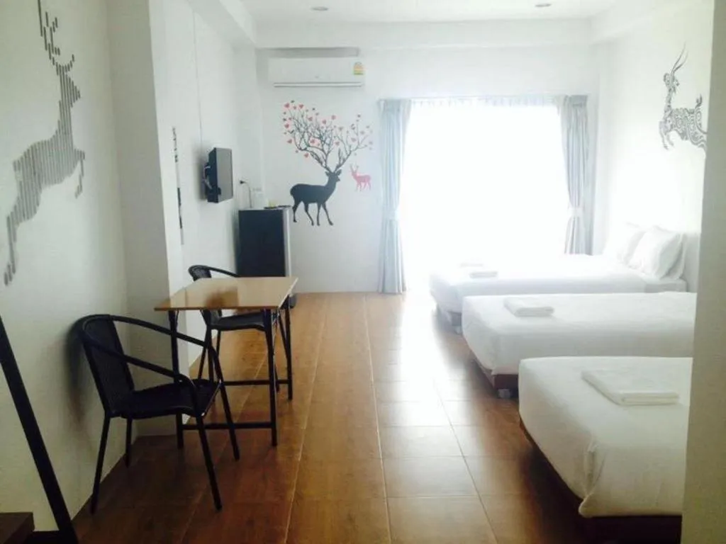 Bed in The Pride Hotel At Laemsing