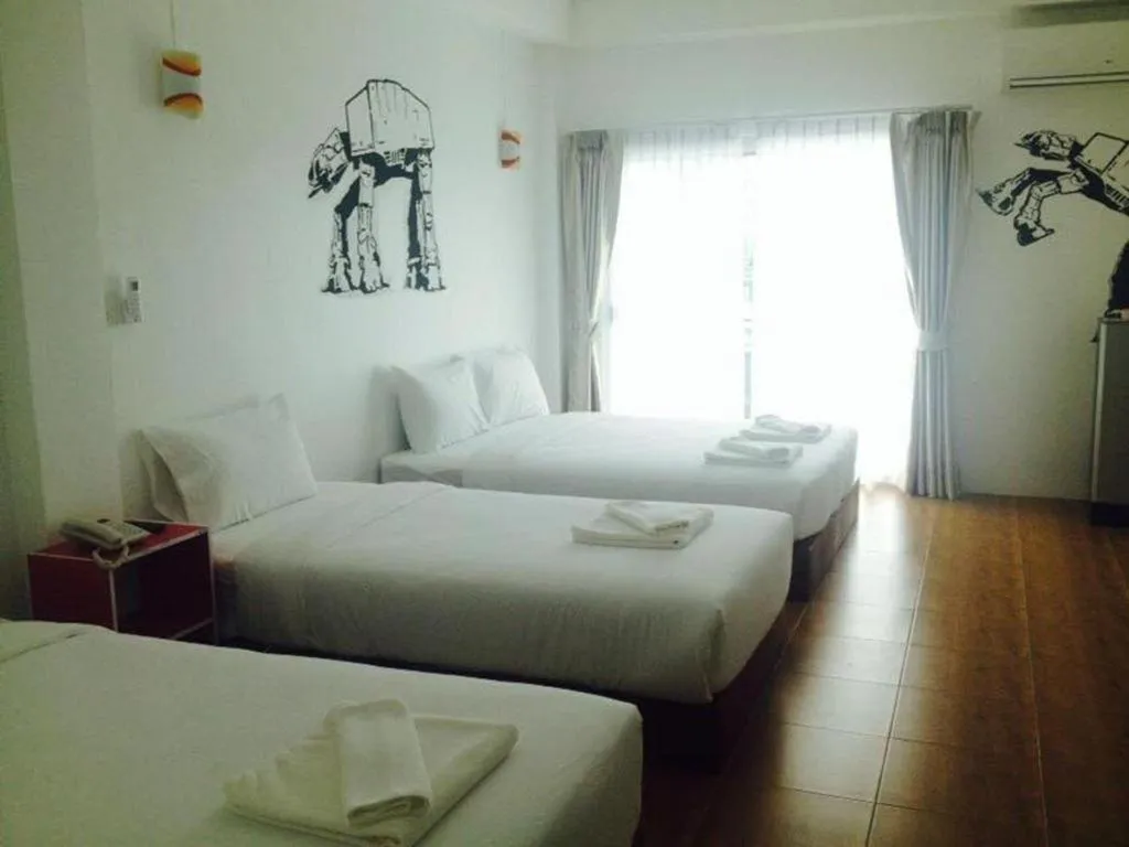 Bed in The Pride Hotel At Laemsing