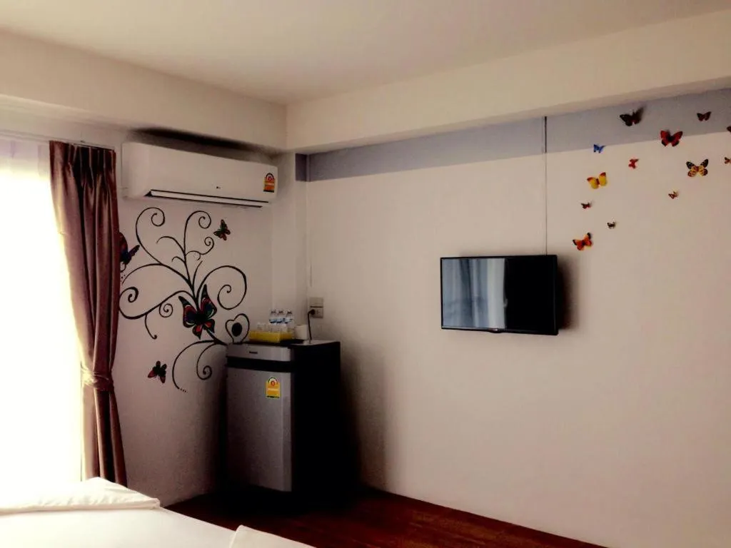 Bed in The Pride Hotel At Laemsing