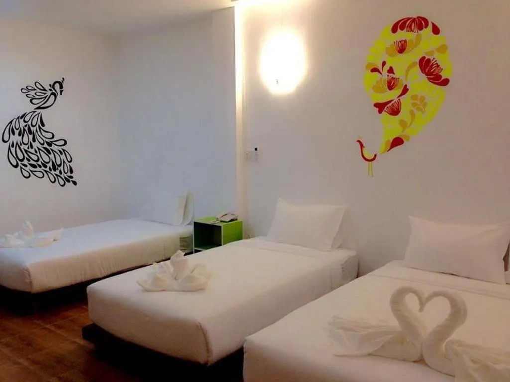 Bed in The Pride Hotel At Laemsing