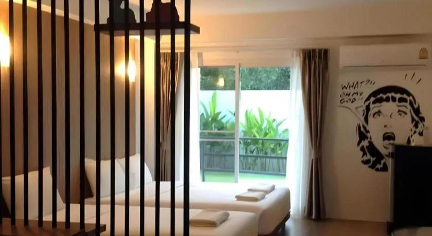 Bed in The Pride Hotel At Laemsing