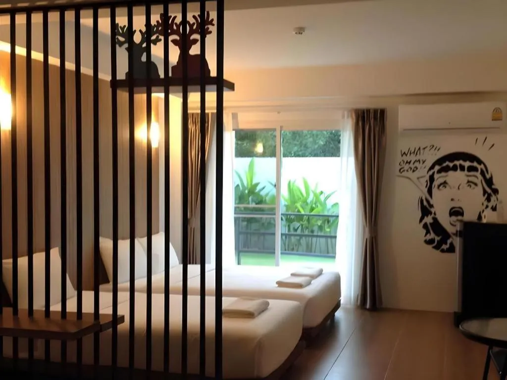 Bed in The Pride Hotel At Laemsing